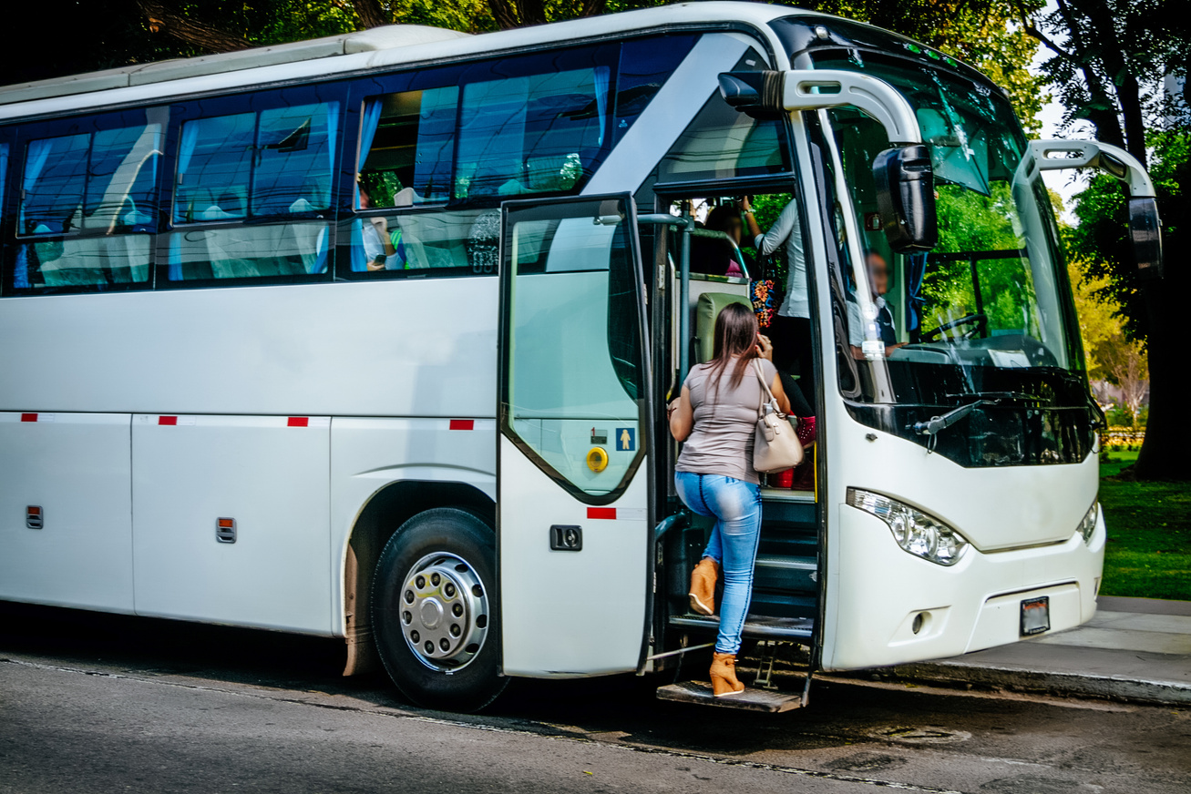 Passenger Boarding a Bus