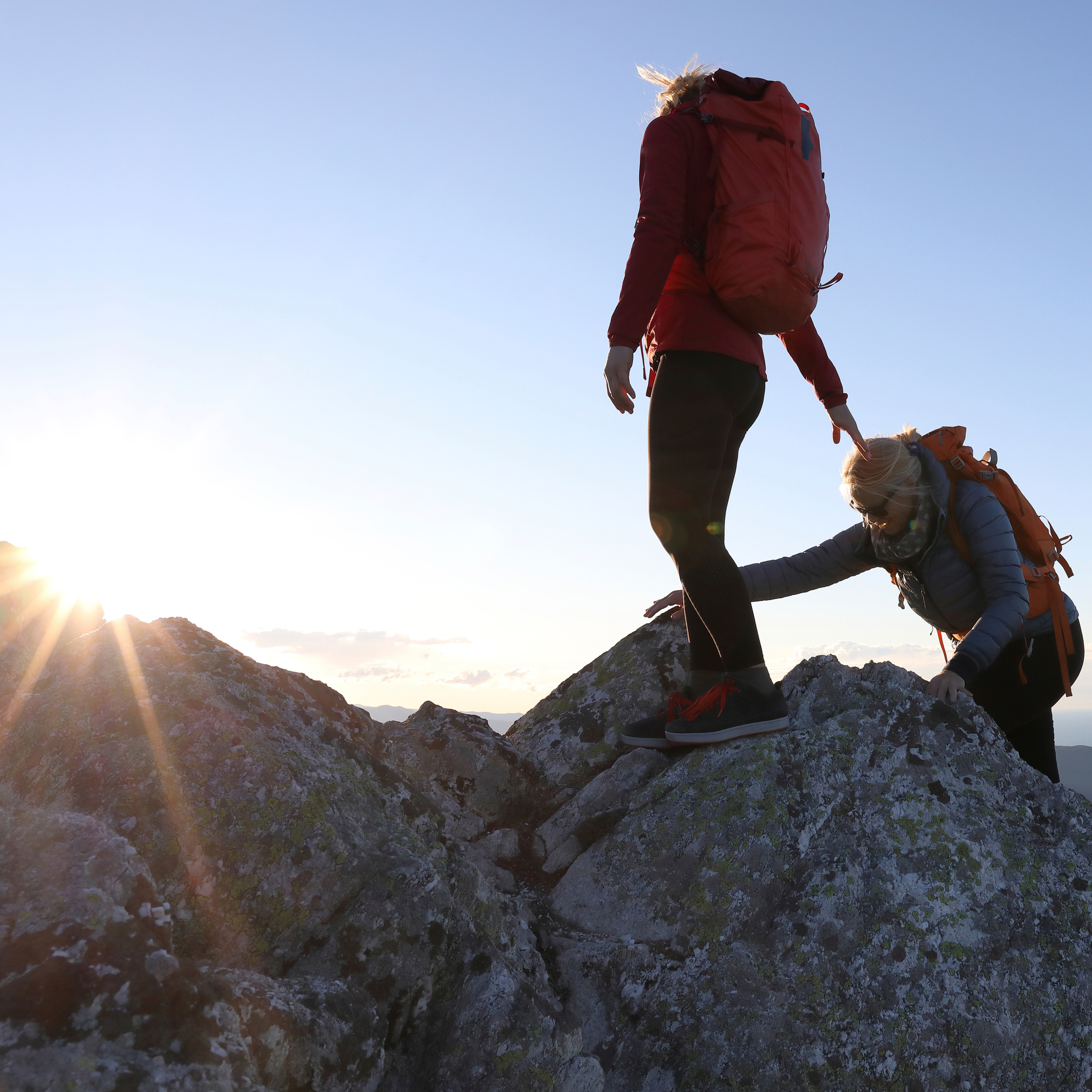 Women climb to the top of mountain